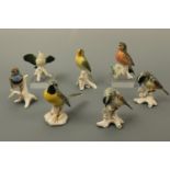 seven bird figurines, tallest 17 cm
