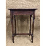 A George V oak occasional table, having a shaped rectangular top, 53 cm x 37 cm x 75 cm