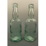 Two F. Armstrong - Penrith glass bottles
