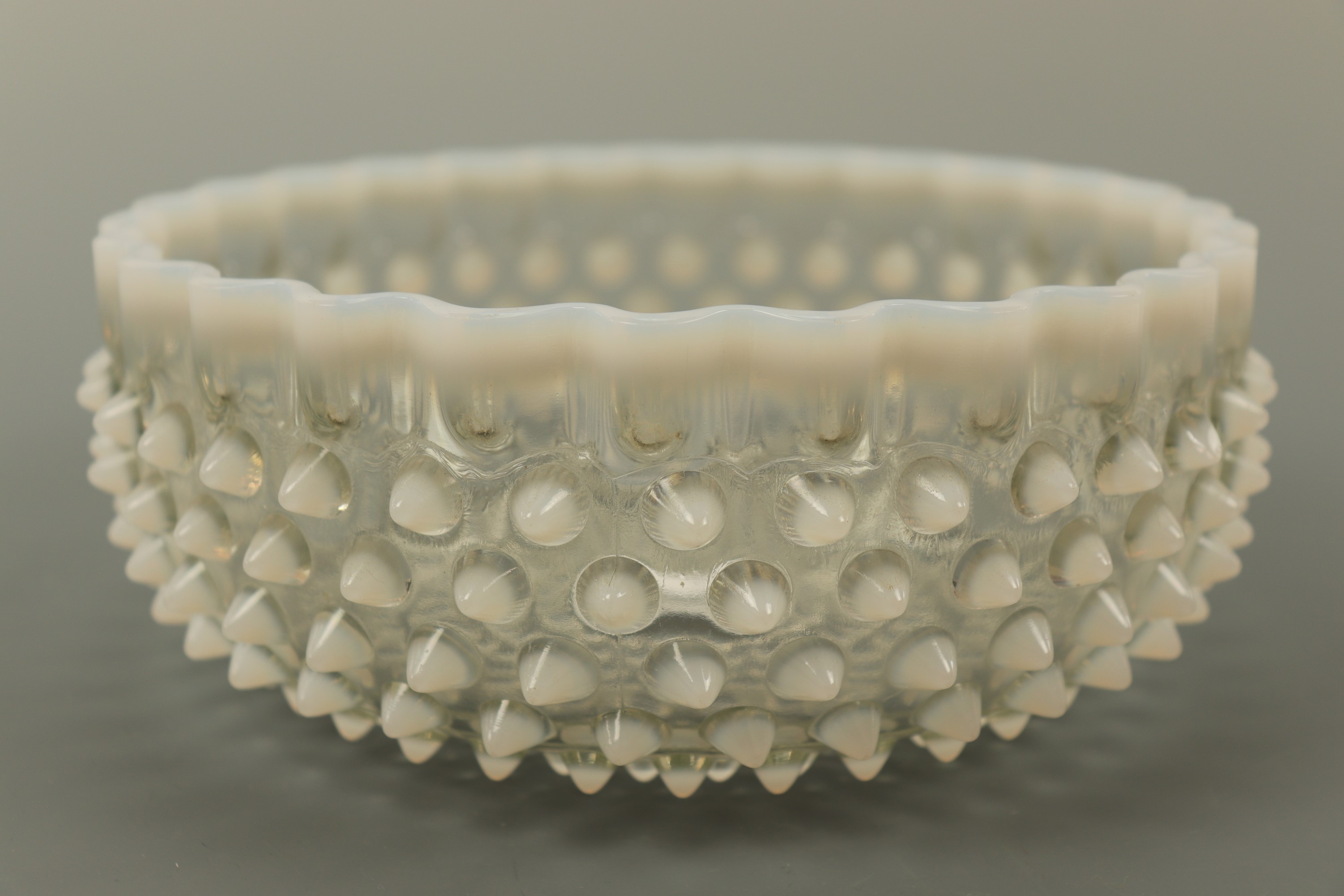 An early 20th Century opaline glass bowl, 20 cm diameter