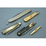 Vintage pocket folding knives including an Inoxid tool knife with horn grip scales