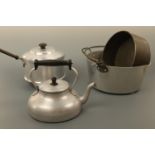 An aluminium AGA four pint kettle, a jam pan, cake tin and pan