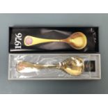 A Georg Jensen 1976 enamelled and gilt Sterling white metal year spoon, sealed and boxed with