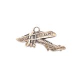 An early 20th Century Bleriot monoplane souvenir pendant bearing the legend "Je viens de France" [