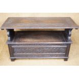 A George V carved oak monk's bench, 122 cm