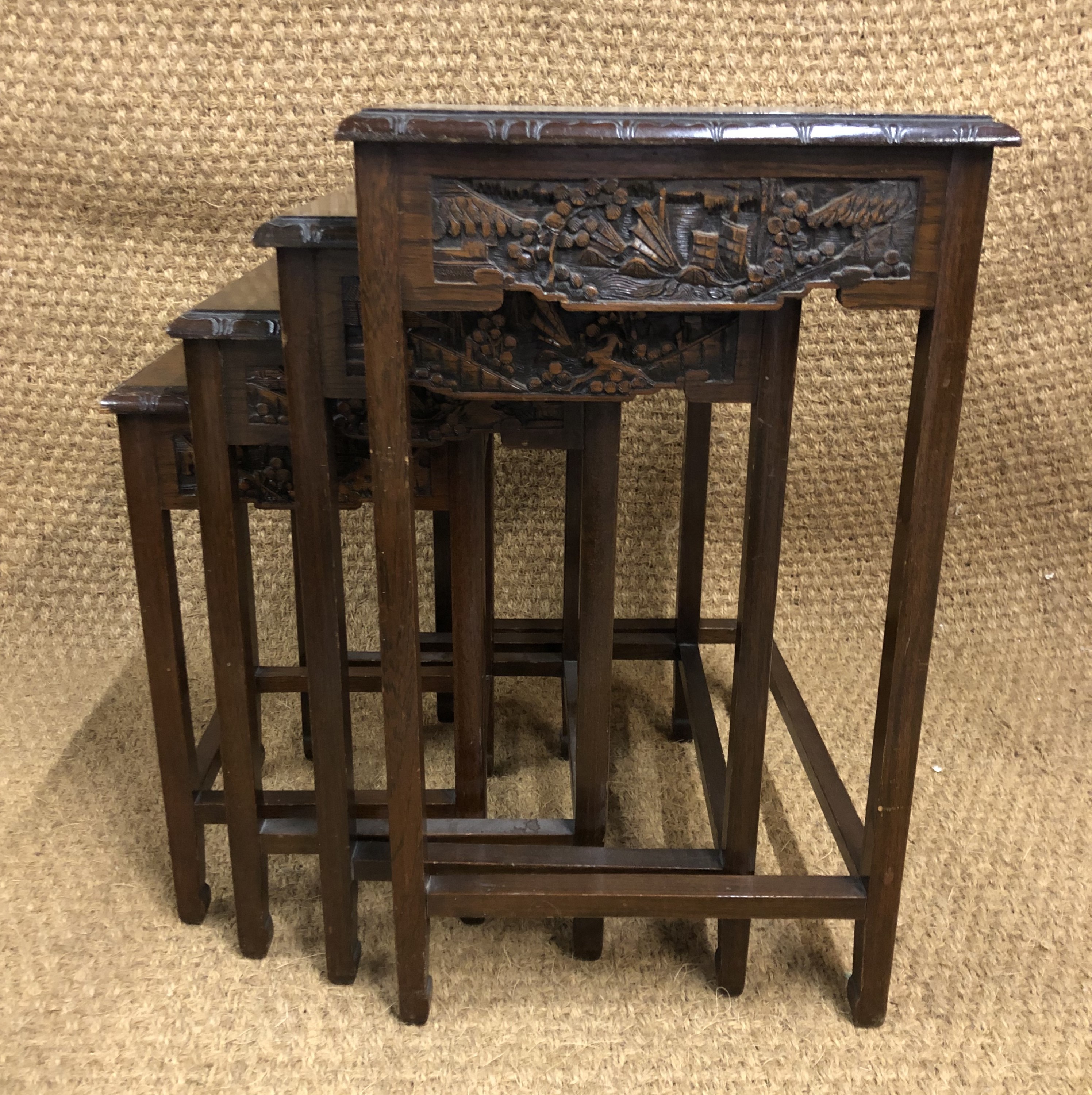 An early 20th Century Chinese carved hardwood nest of tables, 53 cm x 39 cm x 67 cm high - Image 4 of 4