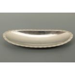 A Lakeland Rural Industries Borrowdale stainless steel dish, 37 × 14 cm