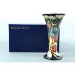 A contemporary Moorcroft trumpet form vase, the "Debden Lane" pattern, signed and printed marks,