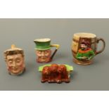 Two Beswick character jugs, a Beswick cup, etc.