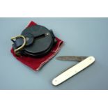 A vintage Boys' Brigade folding clasp knife and a lensatic compass