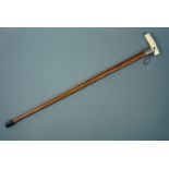 A Victorian ivory handled Malacca cane with silver presentation collar, 1899, 80 cm
