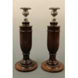 A pair of turned wooden candlesticks, circa 1940s, 30 cm high