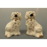 A pair of Beswick small Staffordshire spaniels, 14 cm, (free of damage)