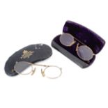 Two cased sets of rolled gold pince nez