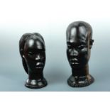 Two African carved hardwood busts, 32 cm and 27 cm high