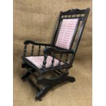 A late 19th Century American sprung rocking chair