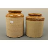 Two antique stoneware jars, 22 cm and 19 cm high