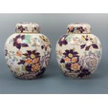 A pair of Mason's amethyst ginger jars, 24 cm high, (free of damage)