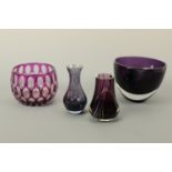 A cased amethyst glass bowl and three other items of amethyst glass