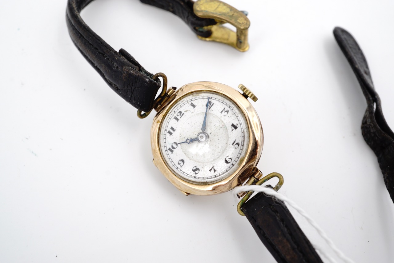 A lady's 9ct gold cased wrist watch, having a Swiss made 15 jewel movement, silvered face and Arabic - Image 2 of 2