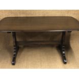 An Ercol refectory style dining table, 150 cm x 83 cm x 74 cm