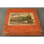 A quantity of vintage tinplate O gauge model railway, including a boxed train set containing a