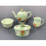 A Beswick Wayside pattern breakfast set, comprising tea pot, sugar bowl, milk jug and butter
