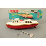 A Sutcliffe Model "Jupiter Ocean Pilot Cruiser" tinplate toy boat, in original carton