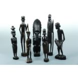 Seven African carved figures, tallest 35 cm