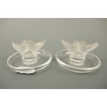 Two contemporary Lalique Lovebirds part-frosted glass sculptures, 9.5 cm diameter, (each chipped)