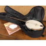 A Remo banjo and case