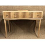 A Vesper Furniture Utility dressing table and bed side cabinet, likely designed by Gordon Russell,