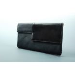 A vintage Art Deco influenced navy and black Morocco leather clutch handbag, circa 1930s, 30 cm x 18