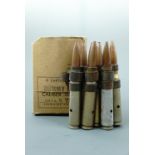 A carton of nine US .50 calibre dummy rounds