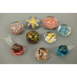 Nine various paperweights including two in the form of birds