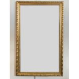 A vintage gilt framed wall mirror by Adams, 76 x 48 cm