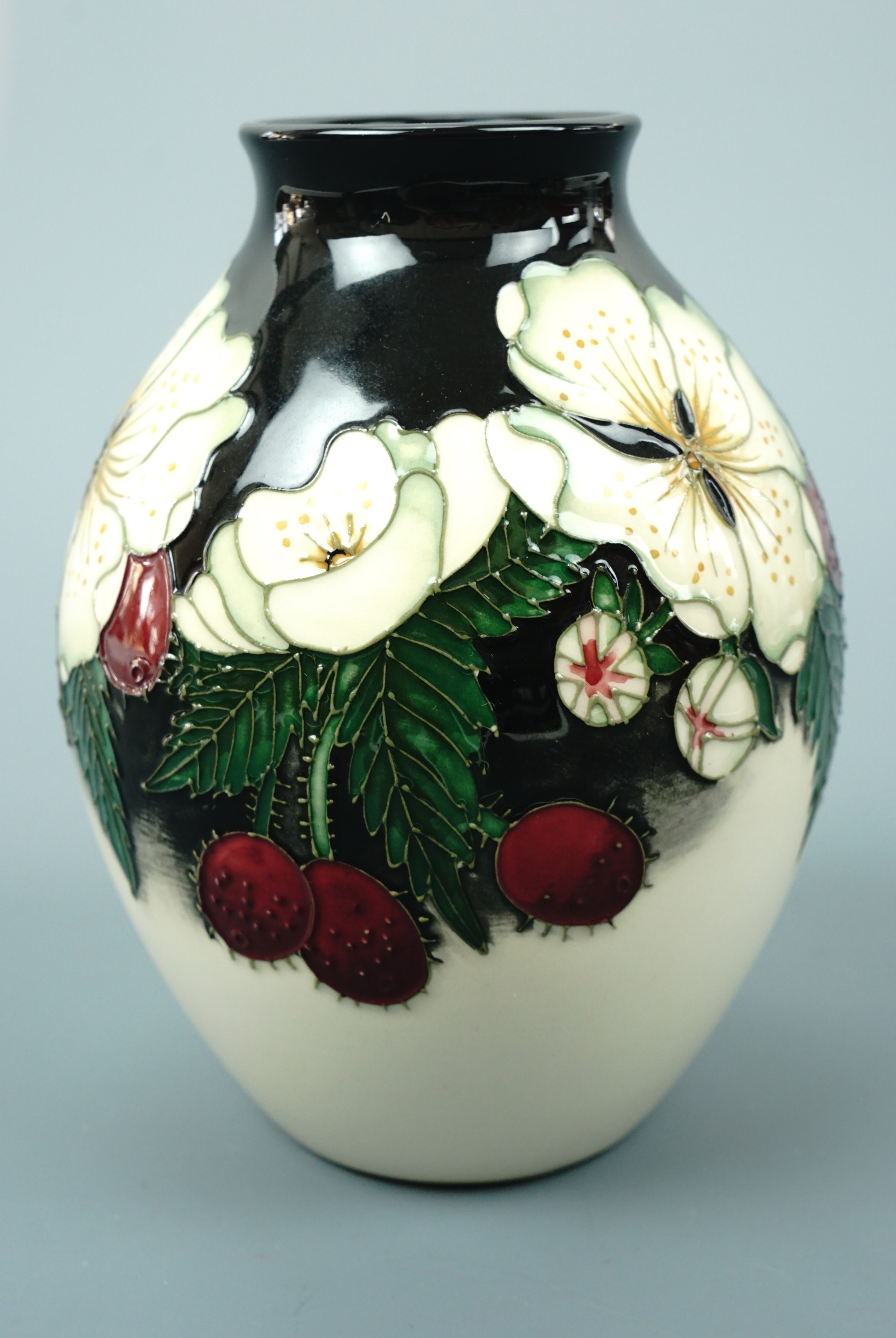 A contemporary Moorcroft limited edition ovoid form vase, the decoration depicting anemones,