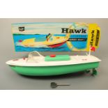 A Sutcliffe Model "Hawk" clockwork tinplate speed boat, in original carton