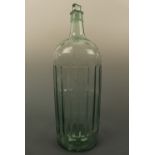 A vintage glass poison bottle, 38 cm high