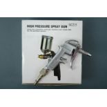 An SG12 high pressure spray gun and one other