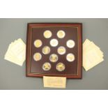 A cased set of limited edition "The Gold of Eldorado" Sterling white metal medallions, appr 360 g