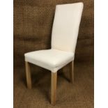 A set of four contemporary dining chairs to take loose fabric covers
