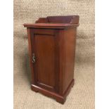 A Victorian mahogany bedside cabinet