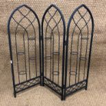 A wrought iron fire screen, 81 cm high