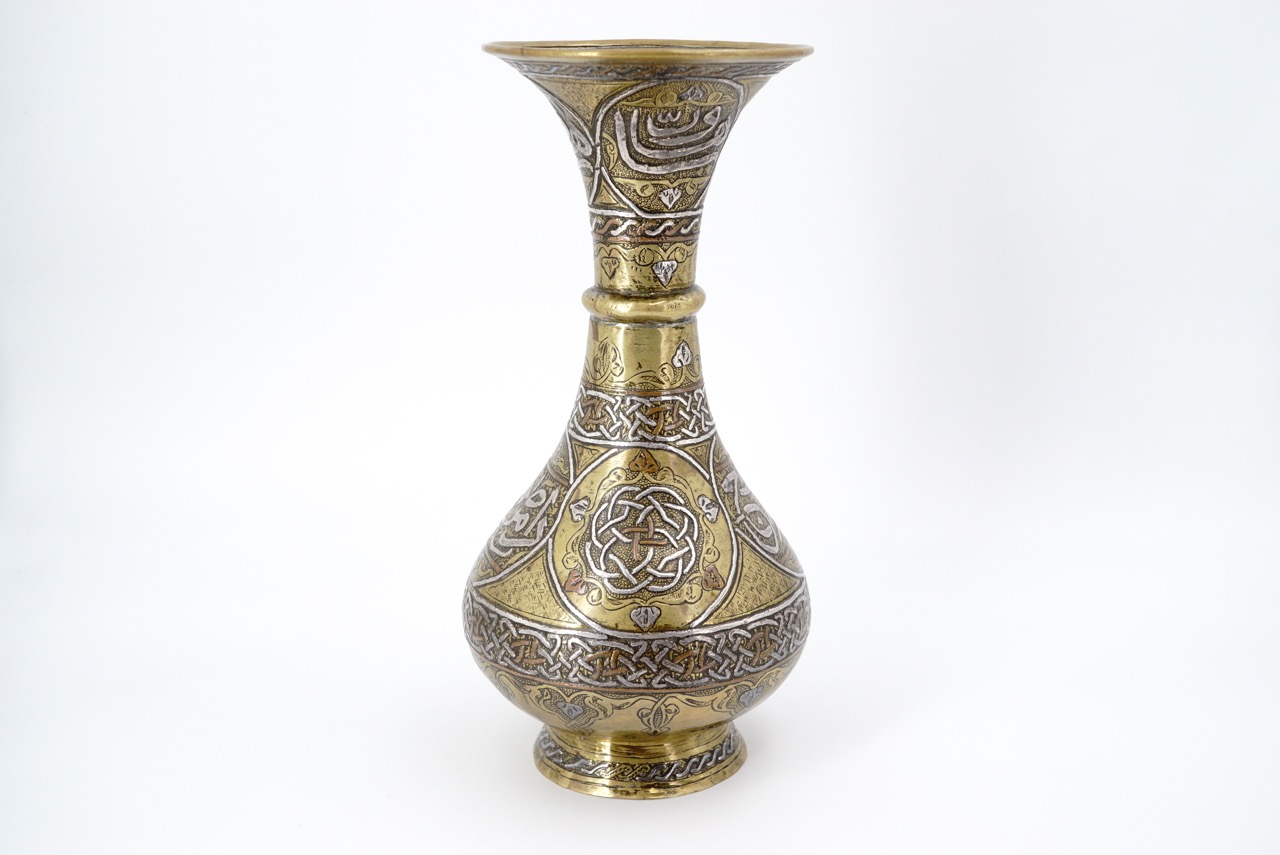 A late 19th / early 20th Century Cairo ware baluster vase, 23 cm