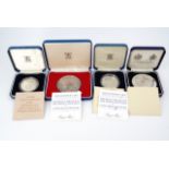 Four Royal Mint / Spink boxed silver royal commemorative coins / medallions, 229 g