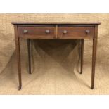 A Sheraton Revival string-inlaid and cross-banded mahogany writing table, 89 cm x 48 cm x 75 cm