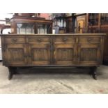 An oak linenfold panelled sideboard, 186 cm x 50 cm x 87 cm