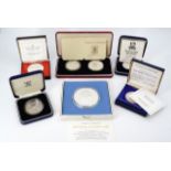 A quantity of Royal Mint and other silver proof and commemorative coins / medallions including a