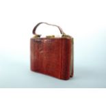 A vintage red reptile skin handbag, 23 cm x 17 cm excluding handle
